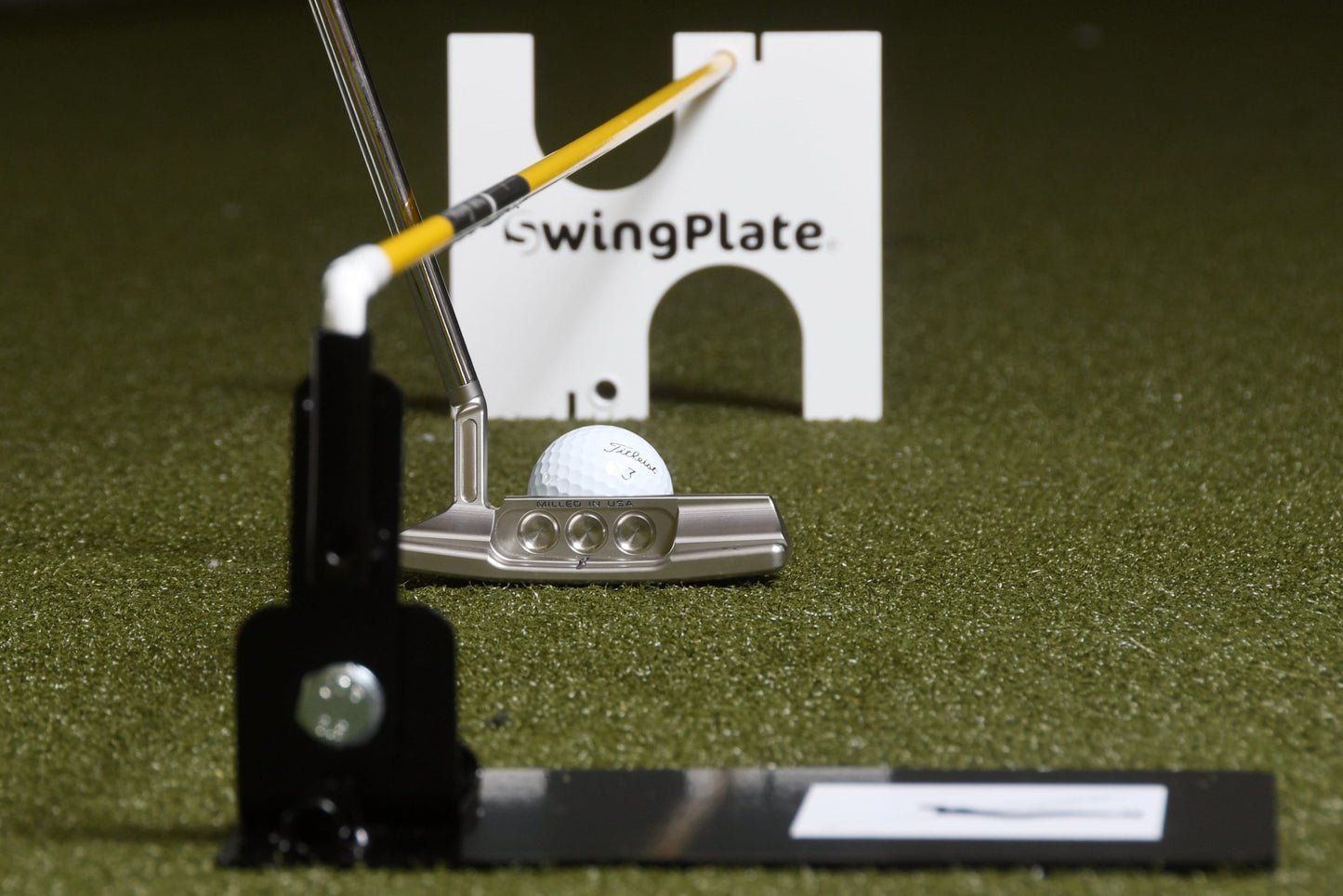 THE SWING PLATE PUTTING GATE
